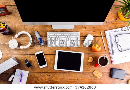 Desk with various gadgets and office supplies. Flat lay Royalty-Free Stock Photo #394182868