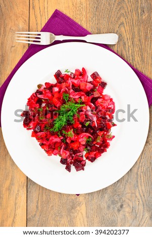 Healthy and Diet Food: Salad with Beets, Onions, Carrots - Vinaigrette. Studio Photo