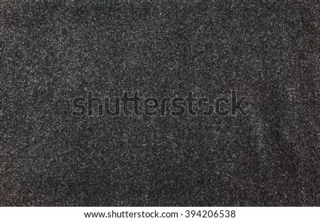 felted fabric dark gray color. Felt texture for text. Royalty-Free Stock Photo #394206538