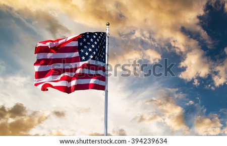 american flag waving  Royalty-Free Stock Photo #394239634