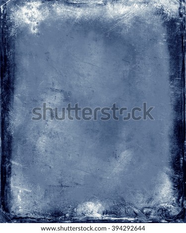 Beautiful blue grunge texture background with faded central area for your text or picture