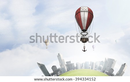 Aerostats flying over city