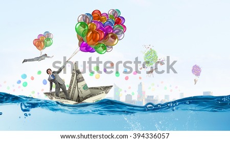 Humorous guy with balloons