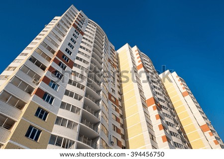 High-rise house on blue sky background 