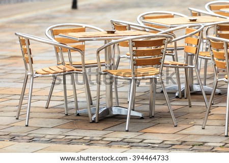Outdoor restaurant coffee open air cafe chairs with table. Summer vacation on resort