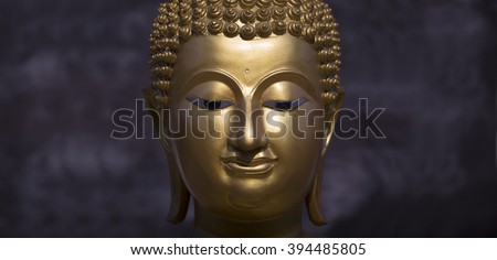 Golden Buddha statue close up