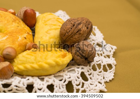 nuts, dried fruits and pastries on the plate