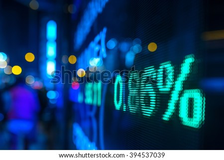 display stock market numbers in a street Royalty-Free Stock Photo #394537039
