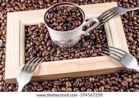 wooden frame, coffee beans, fork