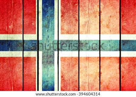 Norway wooden grunge flag. Norway flag painted on the old wooden planks. Vintage retro picture from my collection of flags.