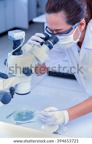 laboratory people who are conducting scientific experiments.