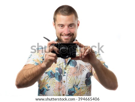 Happy young man taking a picture