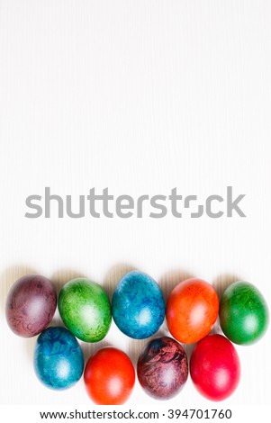 Easter eggs isolated on white wooden background