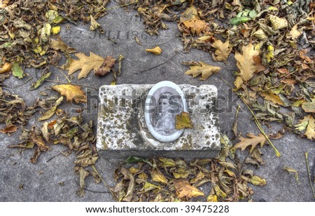Ancient gravestone in autumn