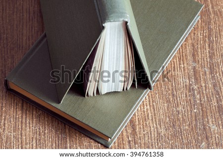 two book in firm cover.