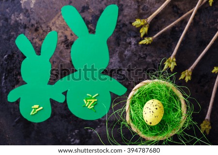 Easter eggs and cute bunny's in green grass. Festive decoration. Happy Easter!selective focus.