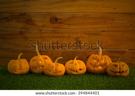 Halloween pumpkins smile and scrary eyes for party night
