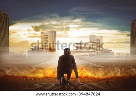 Back view of asian business woman start running over broken road with fire