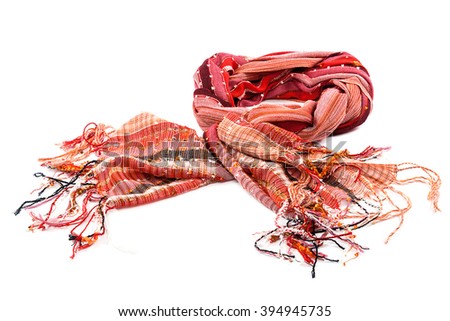 Red scarf with tassels, isolated on white background.