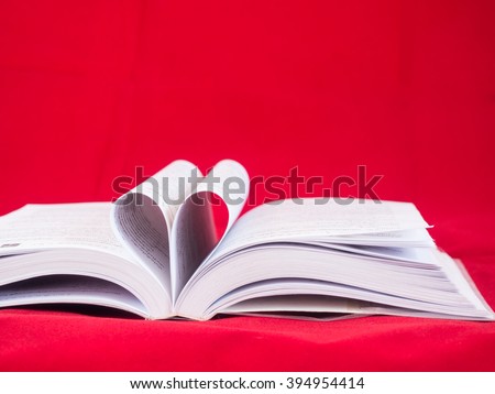 picture of book page that create in heart shape