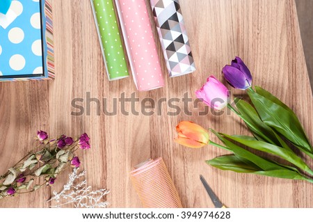 florist desktop with working tools and materials