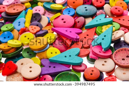Different shape and colors sewing buttons background. Colorful texture. High resolution photo
