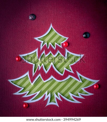 Christmas tree. Paper background close up