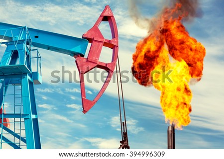 Oil rocking chair on the torch and the cloudy sky background