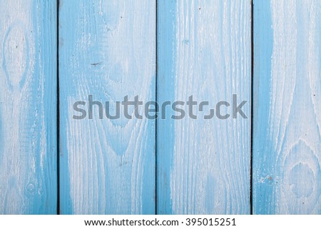 Light blue colored wooden background