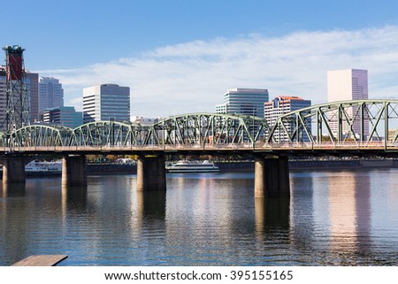 Skyline of downtown Portland Oregon with highrise buildings on the waterfront.