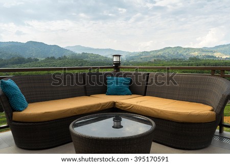 Descrip lifestyle sofa on the mountain landscape