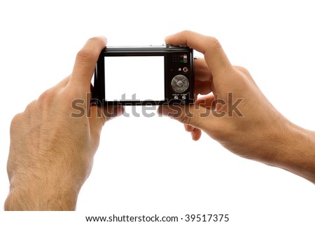 Photo camera in hands isolated on white background