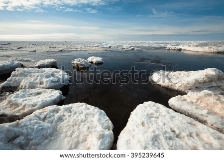 Beach with ice and snow