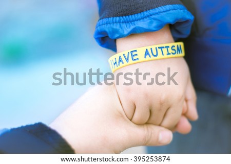 Autism Awareness Picture-I have Autism -Autism Mom holding hand her Autistic Child 
