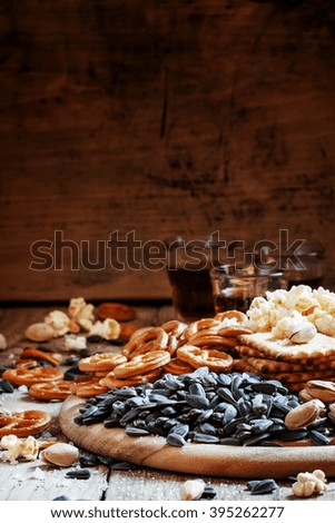 Sunflower seeds roasted salted, a plate of snacks, selective focus