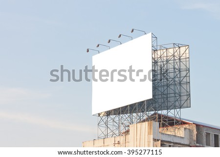 Blank billboard on top of building ready for new advertisement