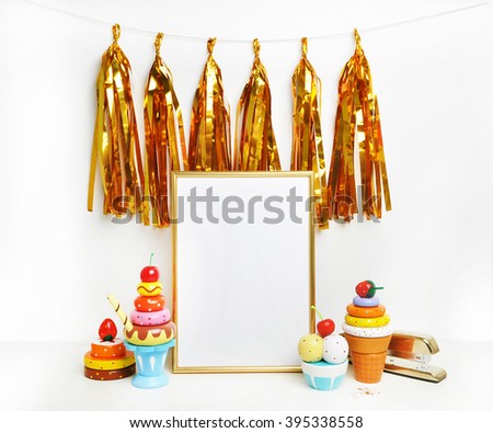  Golden Frame mockup. Candy bar with decoration. Gold tassel. Stapler. Party background