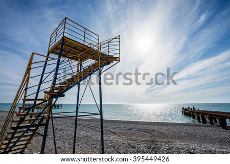 Rescue tower on beach on background beautiful seascape in summer season