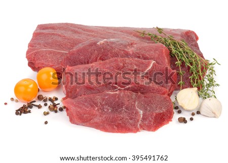 entrecÃ´te steak on the white background with greens