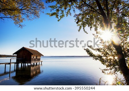 old wooden boathouse at a lake
