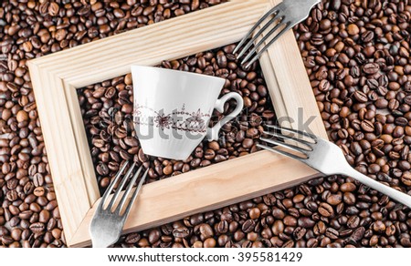 wooden frame, coffee beans, fork