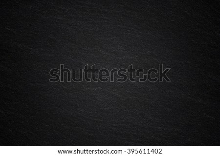Dark grey black slate background or natural stone texture. Royalty-Free Stock Photo #395611402
