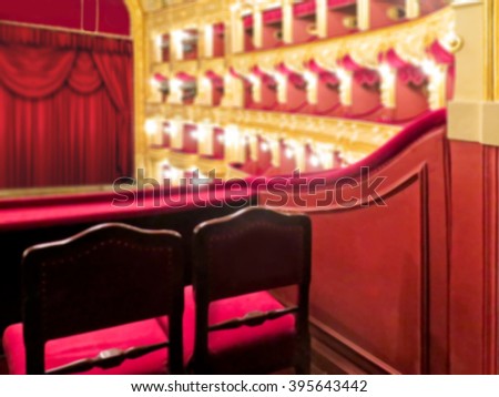 The interior of the theater arts. The auditorium with seats and balcony. Soft focus