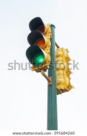 Isolate of old traffic light , color is yellow