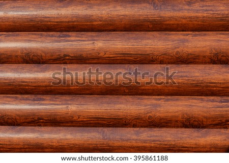 New log texture as background with a copy of the space. Brown horizontal logs texture.