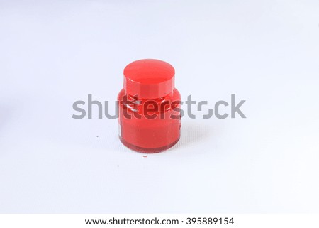Red ink bottle