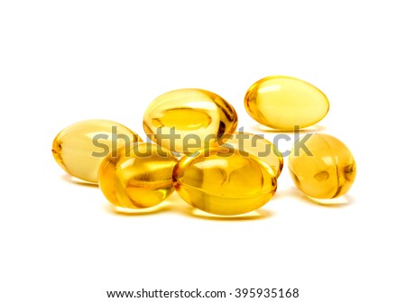 Fish oil supplement capsules isolated on white background