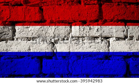 Netherlands flag on a brick wall