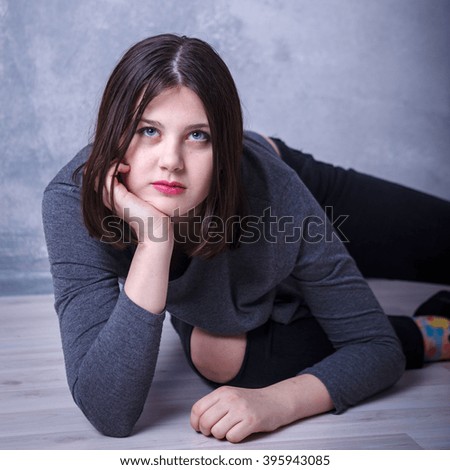 teen girl posing in studio