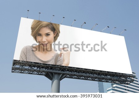 billboard with picture of business woman
